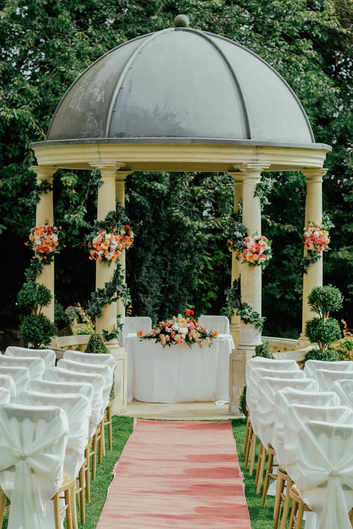 Corporate event setup with round tables and premium linens